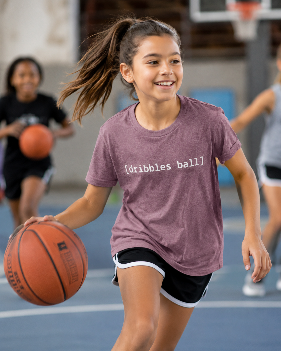 [dribbles ball] — Youth Tee