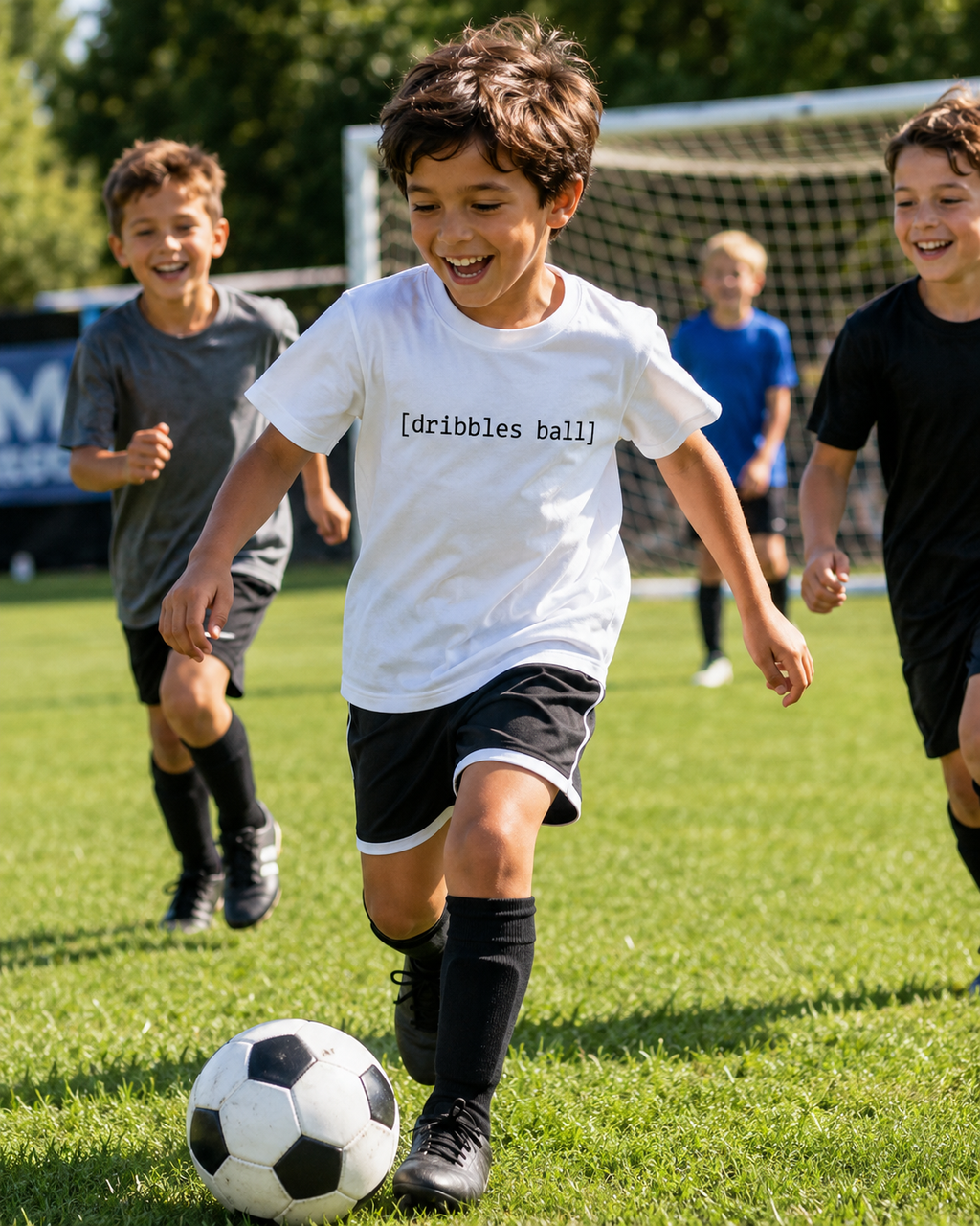 [dribbles ball] — Youth Tee