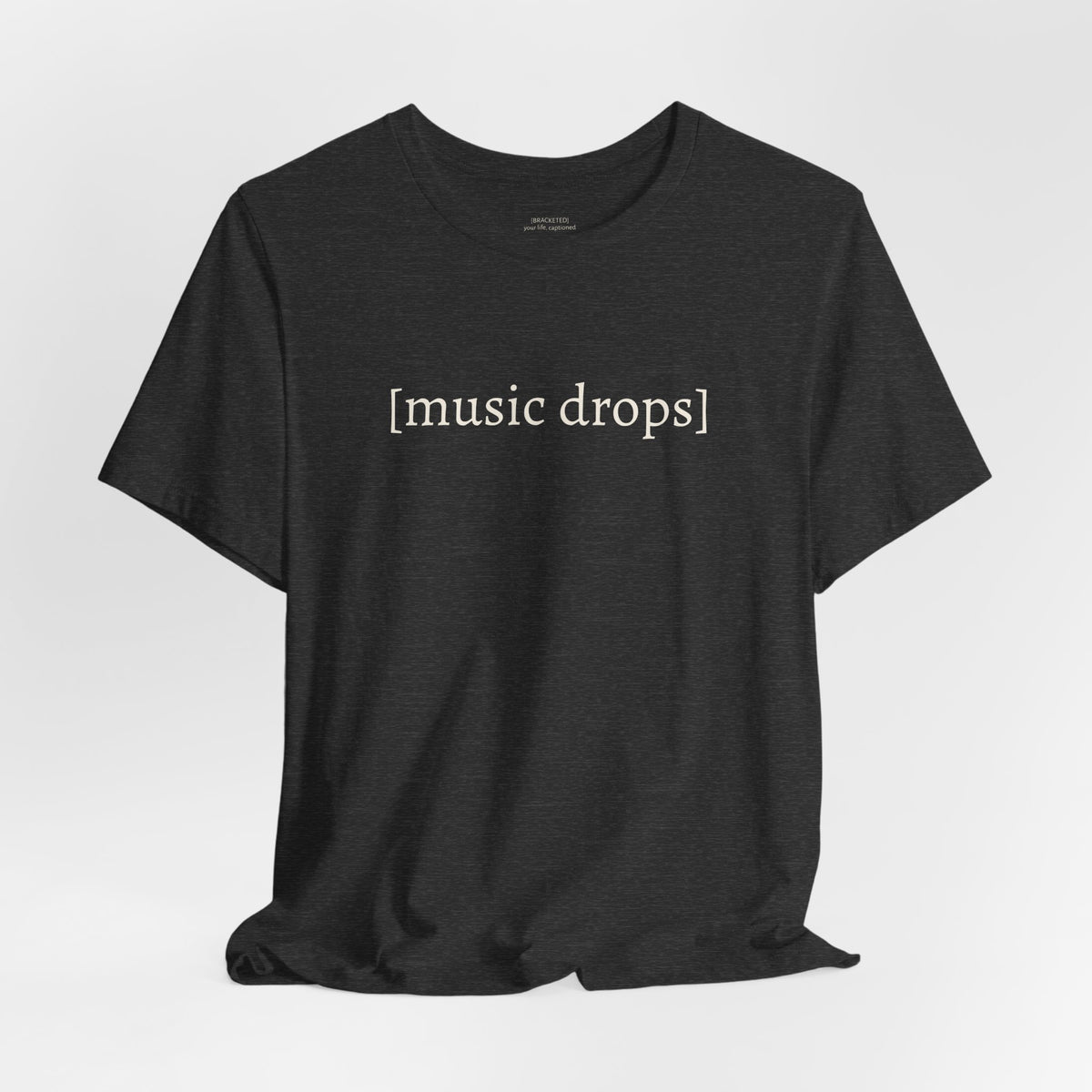 [music drops] — Unisex Jersey Tee